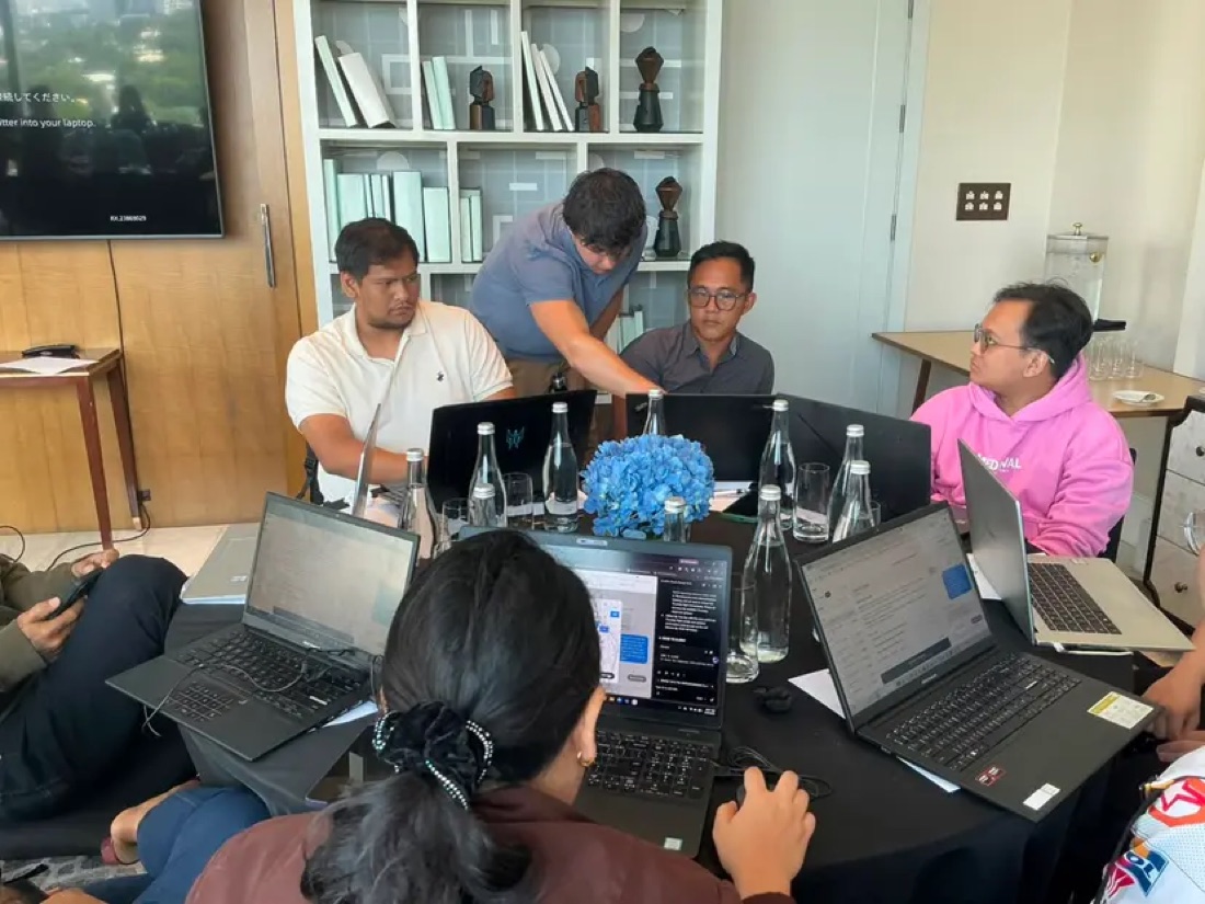June concierges learning together during an in-person training session